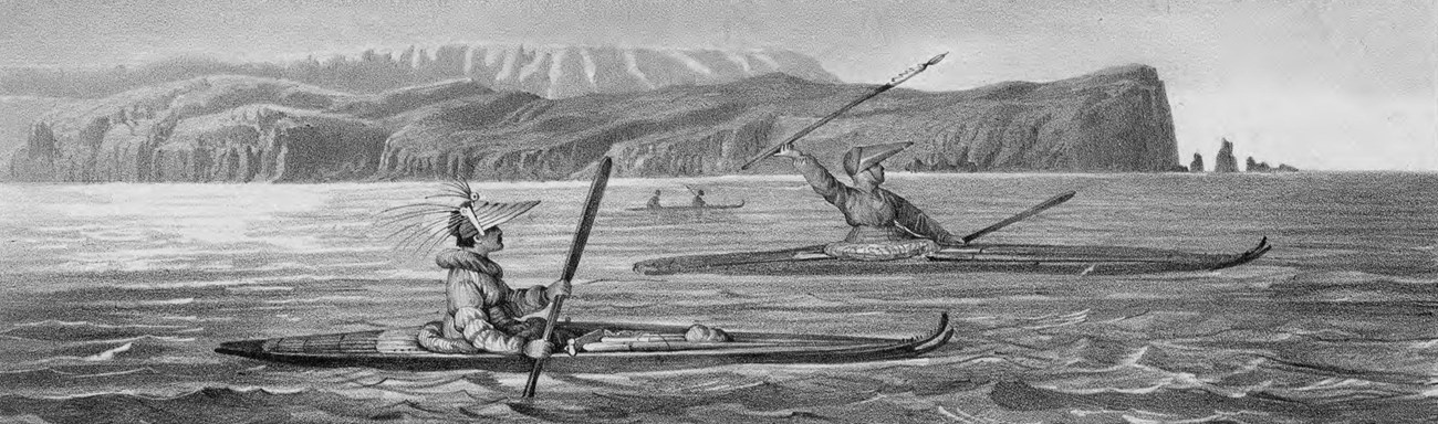 in an illustrated historic scene, two men paddle long wooden boats through ocean waters skirting a coastal mountain range.