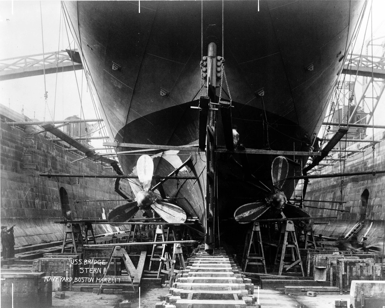 Bridge-CNY-Bosts-10536-136 The hull of a ship from within a dry dock.