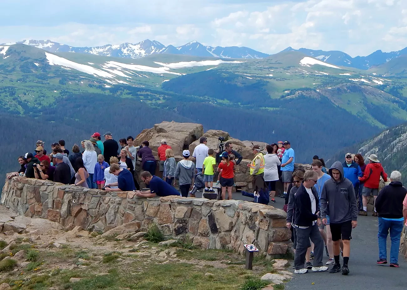 Forest Canyon Overlook A mountain view with an overlook crowded with visitors