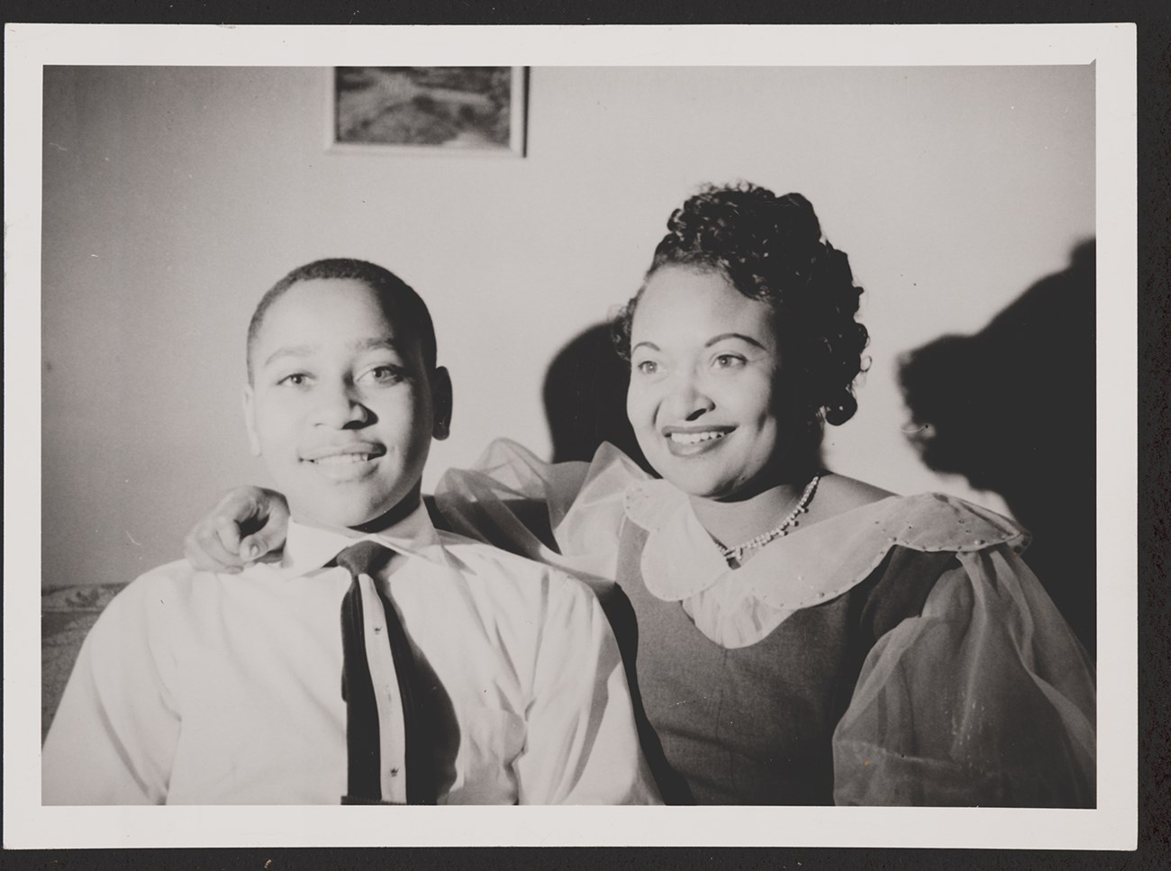 Historical black and white image of Emmett Till and Mamie Till-Mobley