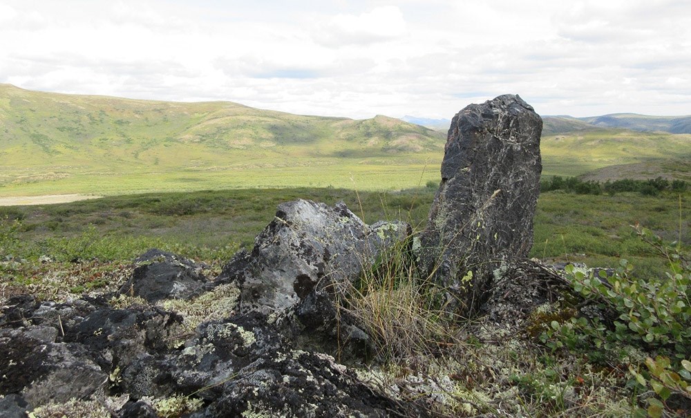 Inuksuk-1A-Freeburg_web A stone monument stands on the tundra that has been used for centuries to herd caribou.