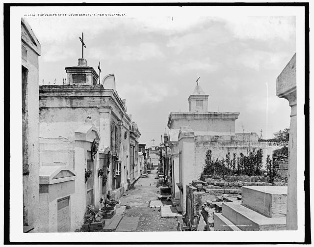 An image of the tombs and vaults of St. Louis Cemetery, New Orleans, La. from an unknown location, displayed in black and white.
