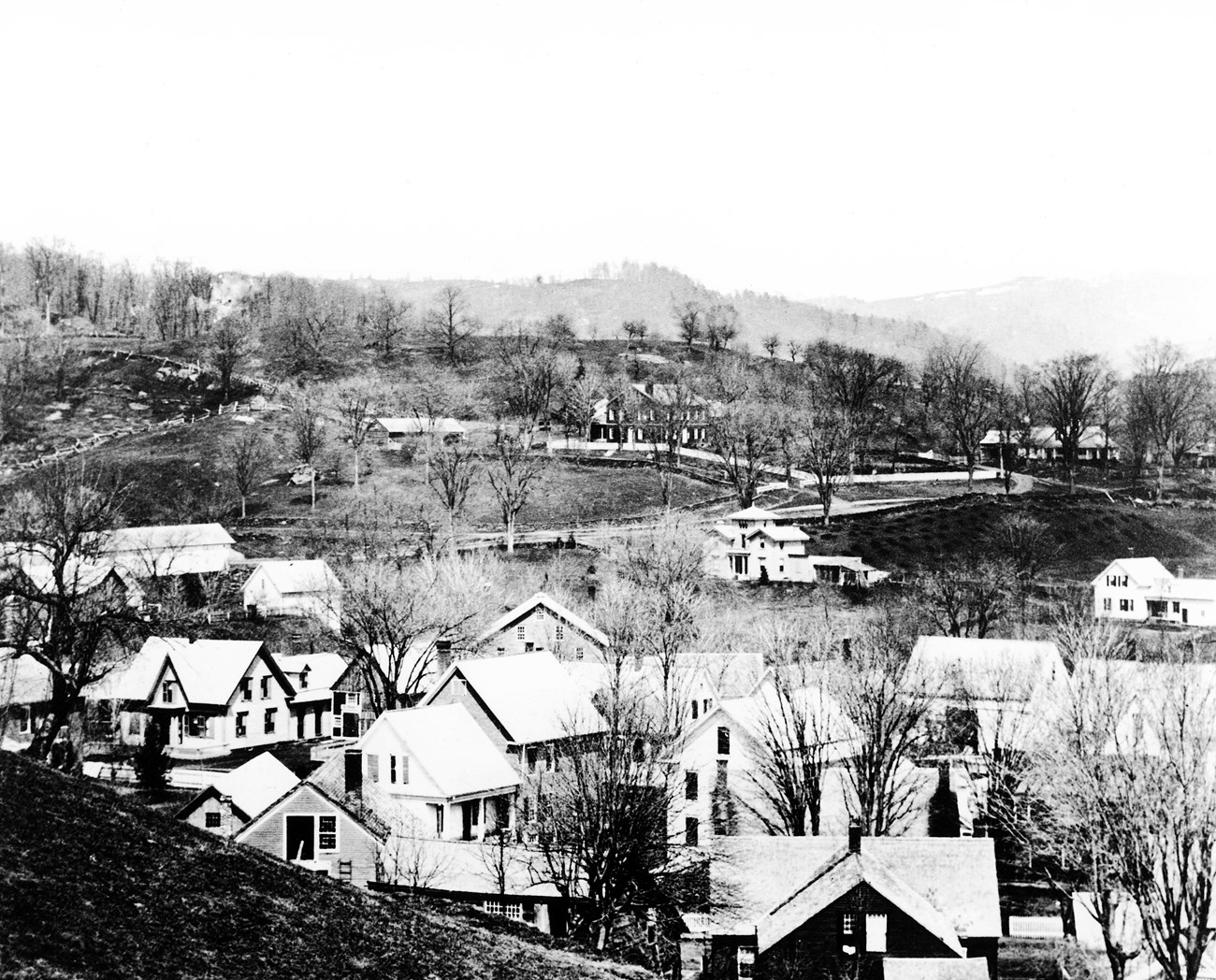 Marsh Place 1869 black and white 1869 photo of vermont hillside with Marsh mansion in the distance