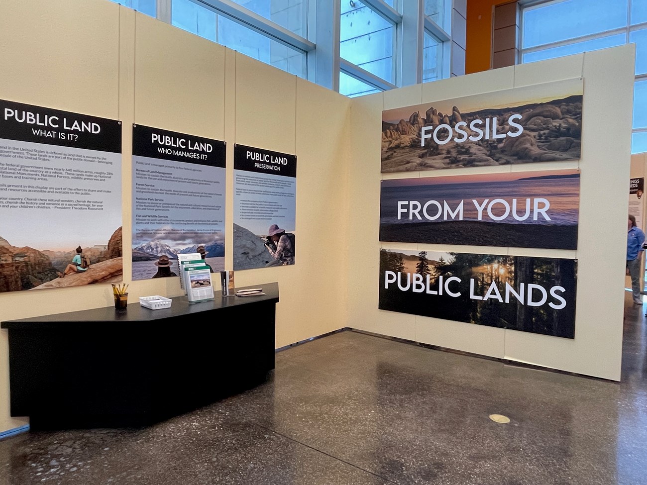 Photo of visitor center signs, "Fossils from your public lands".