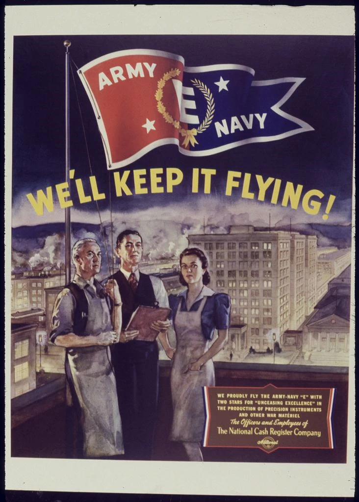 We'll Keep It Flying poster Illustration of 3 factory workers (a gray-haired man, middle-aged man, and younger woman) posing on a rooftop below an Army/Navy E for excellence flag. "We'll keep it flying!" appears in yellow text above them.