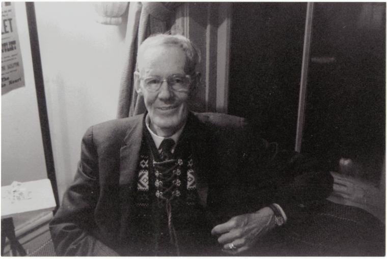 Prescott Townsend sitting in a chair smiling.