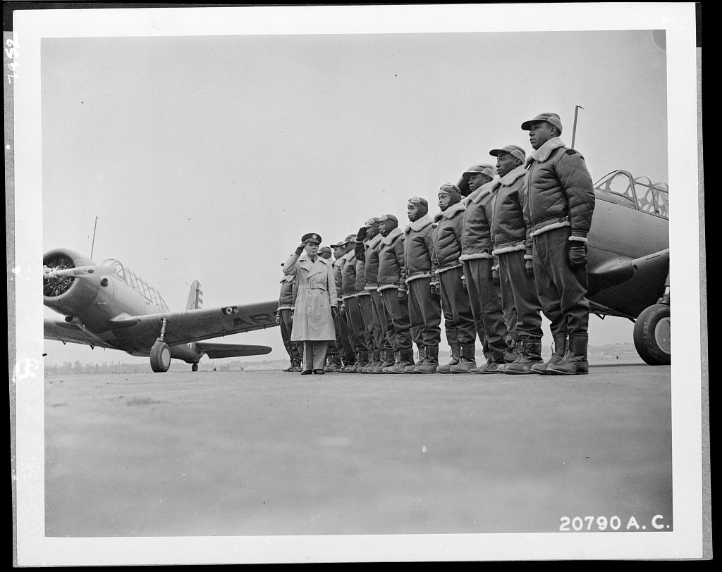 Cadets lines up for review with Major Ellison returning a salute