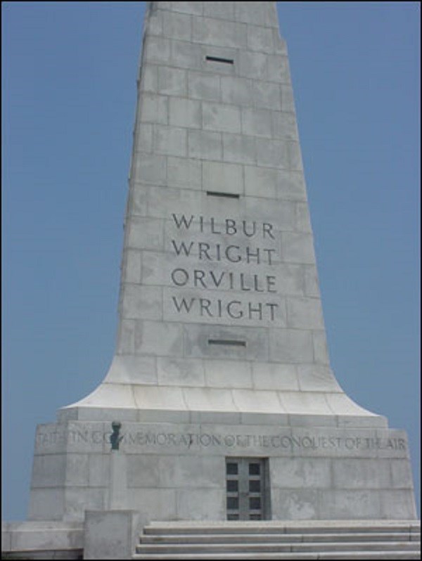 White stone monument to the Wright Brothers. White stone monument to the Wright Brothers.