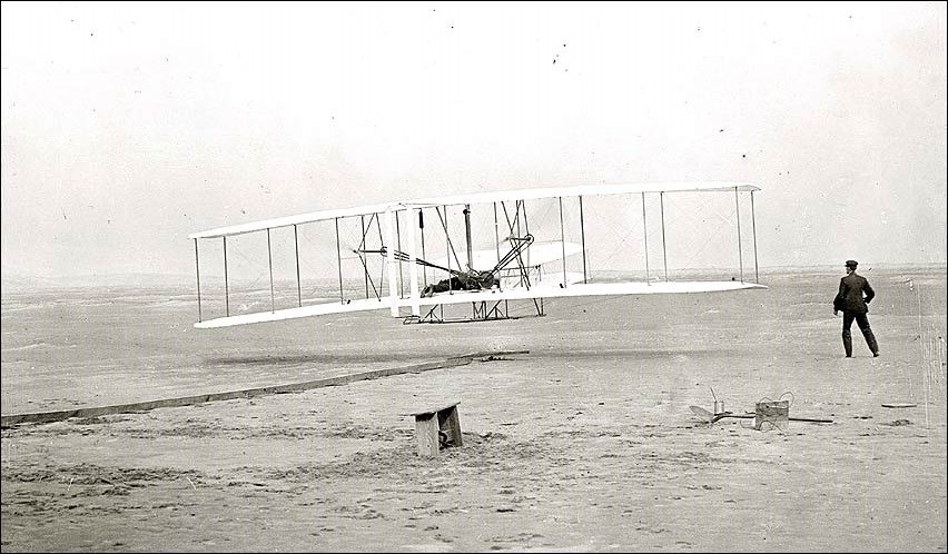 Wright brother taking off in plane for first time in 1903. (National Air and Space Museum, Smithsonian Institution, SI-2002-16646) Wright brother taking off in plane for first time in 1903. (National Air and Space Museum, Smithsonian Institution, SI-2002-16646)