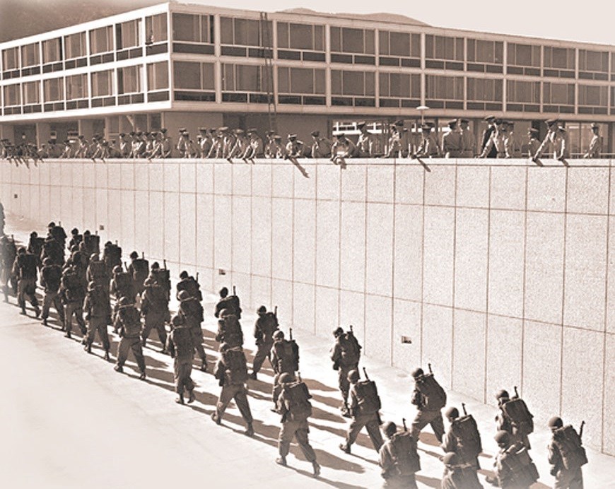 Cadets marching up a ramp. Cadets marching up a ramp.