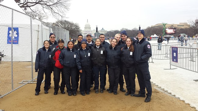 Montgomery County First Aid Unit, Explorer Post 742 A group of teens wearing EMT uniforms stands along the National Mall with the capital in the background.