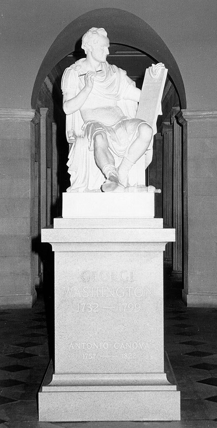 Tall marble statue. Tall marble statue.