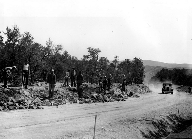 CCC constructing road into Frijoles Canyon.