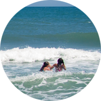 Visitors enjoying the fresh waters of the Atlantic Ocean