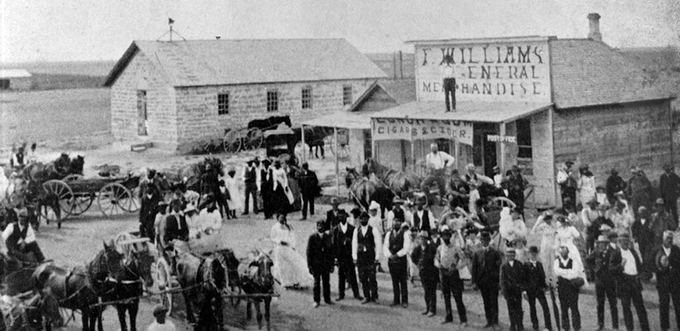 Residents of Nicodemus, Kansas on Washington Avenue