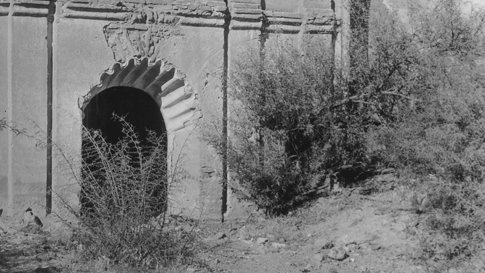 historic photo of scallop motif over church front door