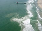 shoreline with breaking waves and a rip current