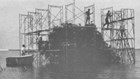 historical photo of men on scaffolding