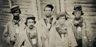 Four uniformed Confederate soldiers stare directly at the camera in this sepia photo.