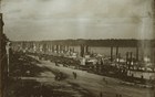 Photograph of the St. Louis riverfront in 1852. Steamboats are docked on the Mississippi River.