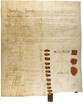 An old parchment document with cursive handwriting, red wax seals, and signatures crowded onto it. 