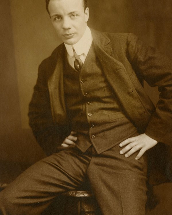 Theodore Roosevelt, Jr. wearing a suit and tie poses for a portrait.