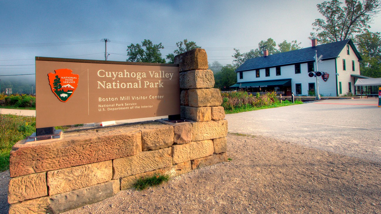 Sign with stone base reads 