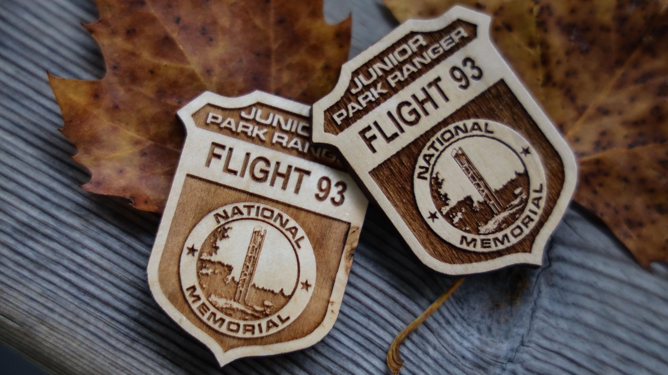 Image of two Flight 93 Junior Ranger Badges