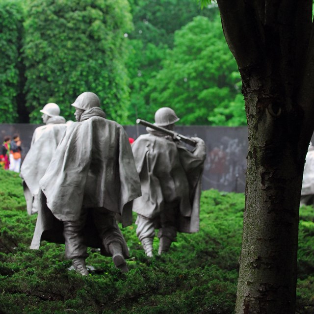 Sculptures of soldiers in the Korean War Veterans Memorial.