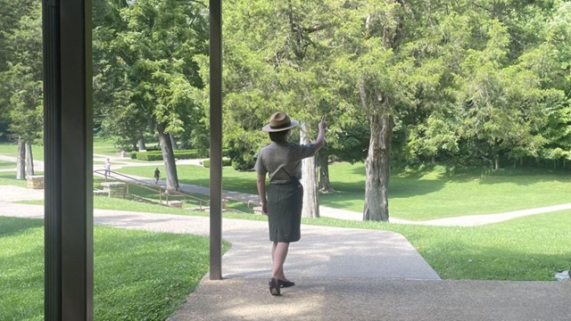 ranger pointing at tree