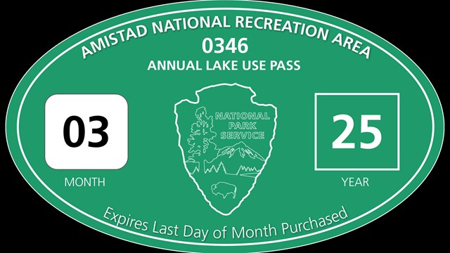 Annual Lake Use Pass stickers with large oval for boat and smaller rectangle for trailer.