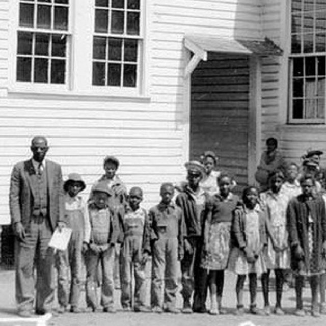 Students in front of school. 