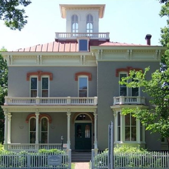 Photo of a large house. 