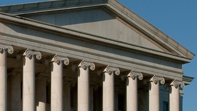 A big building with several large columns