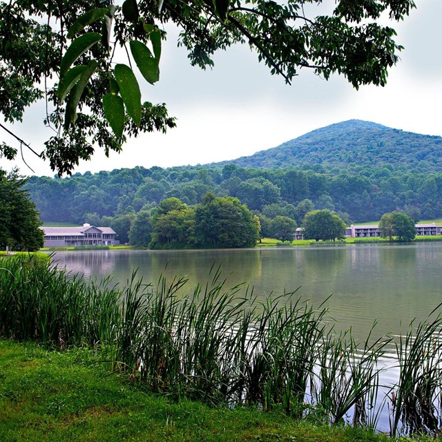 Sharp Top Mountain and Peaks of Otter Lodge across Abbott Lake.