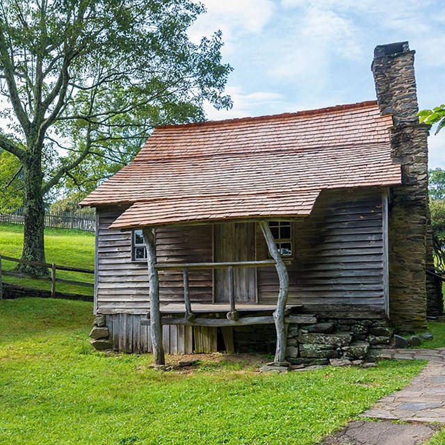 historic Brinegar cabin in early summer