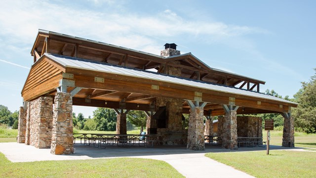 A sidewalk path leads to Tyler Bend Pavilion.