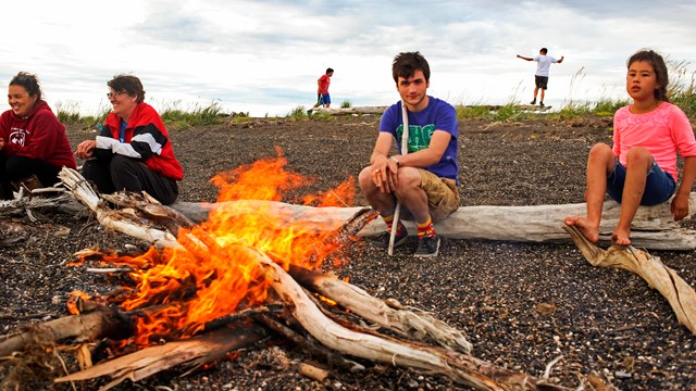 Camp fire alongside a youth program 