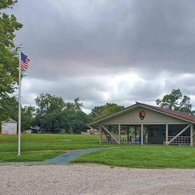 Oakland Plantation Welcome Pavilion - a grey covered concrete pad