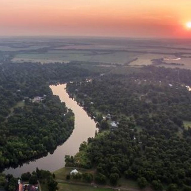 River from above - with grass and trees