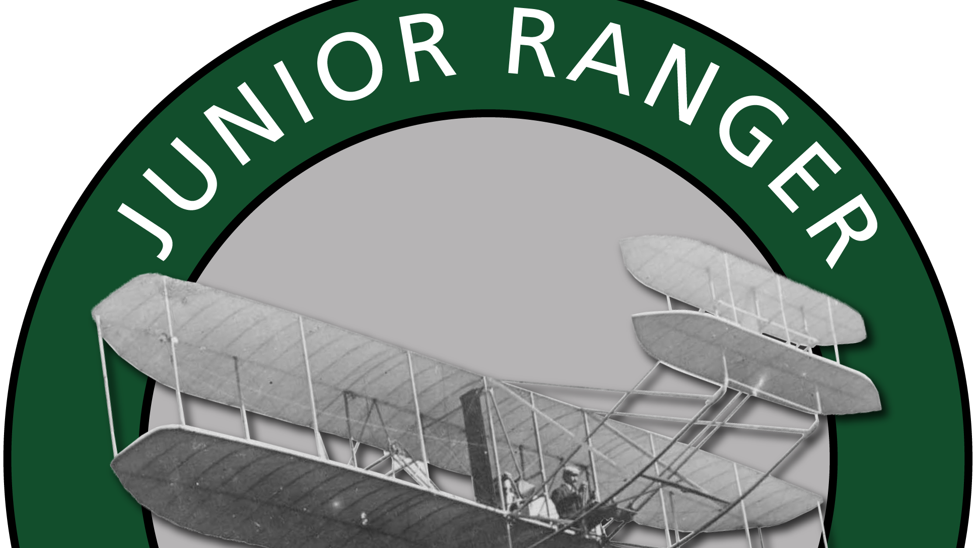 A picture of a Wright brothers plane on the Jr. Ranger logo background