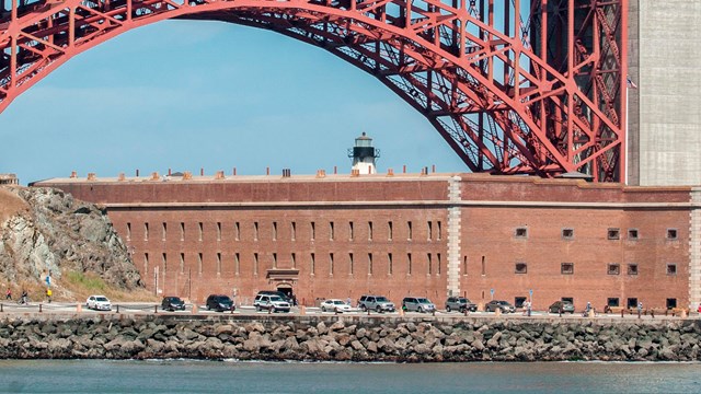 Cars parked infront of the fort 