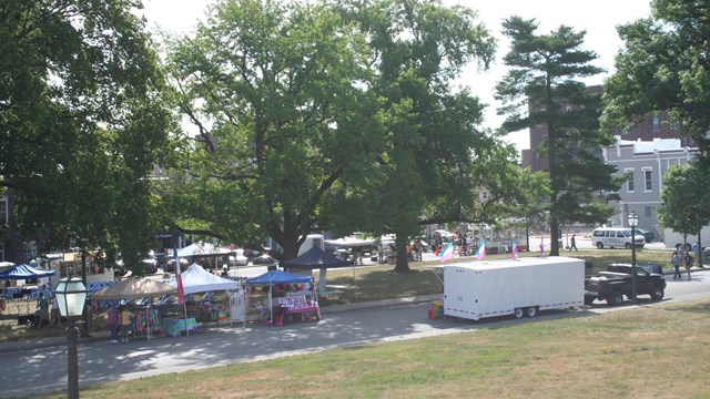 Food trucks and vendors line Patrick Henry Square during a festival