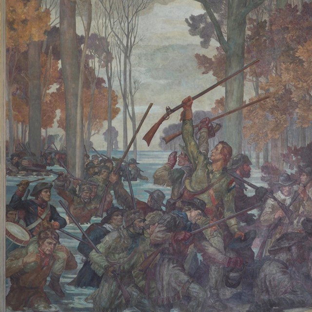 Clark and his soldiers walk through the flooded wilderness.