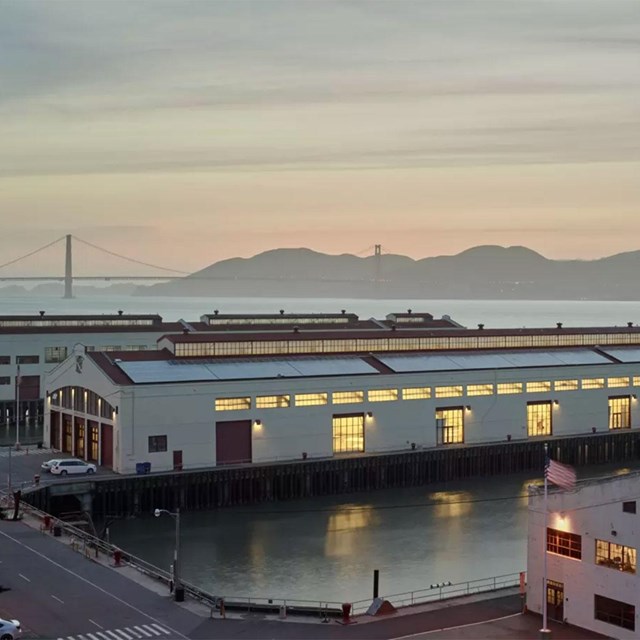 sunset on golden gate bridge at fort mason center