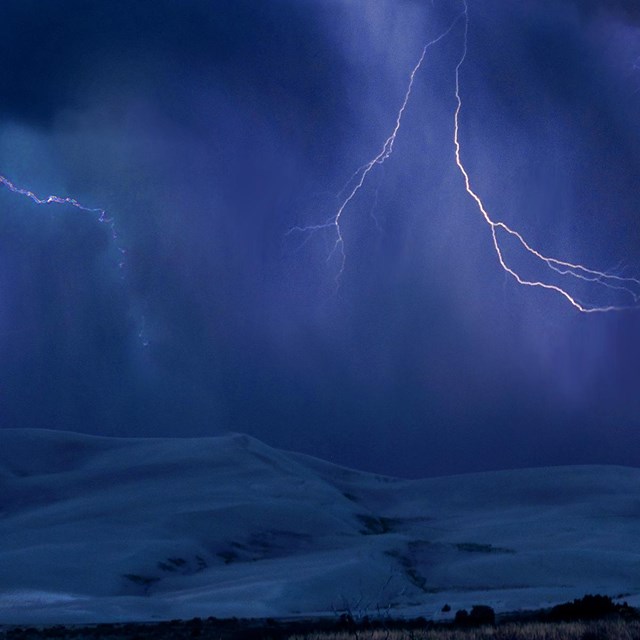 Lightning over dunes