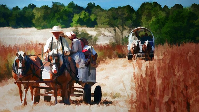 Picture of people riding in the wagon through a prairie. 