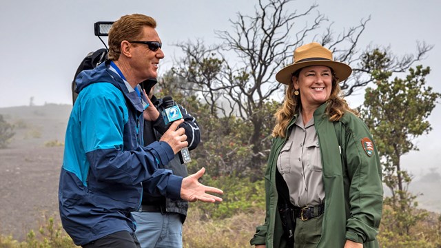 Ranger working with a news crew.