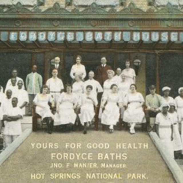 Fordyce employees from the mid 1900s gather outside the Bathhouse.