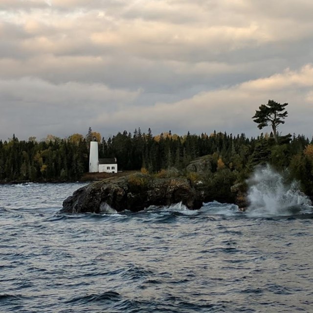 dark, cloudy view of the Rock Harbor Lighthouse